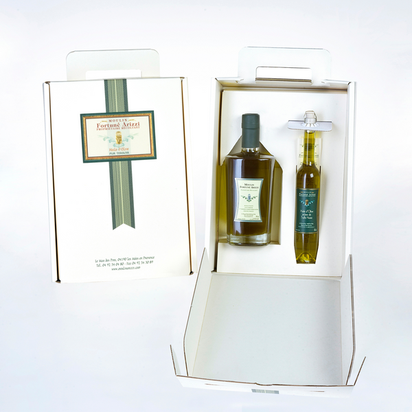 Elegant coffret contenant une bouteille d'huile d'olive de 500 ml et une boite d'huile d'olive á l'arôme de truffe